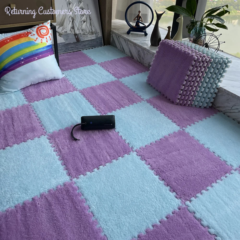 A plush interlocking puzzle rug mat featuring a pink and light blue diamond pattern on a floor.
