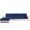 A modern navy blue sectional sofa with cream upholstery and seat cushions.