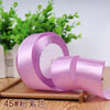Roll of 4 cm wide satin ribbon in light purple for gift wrapping and DIY crafts