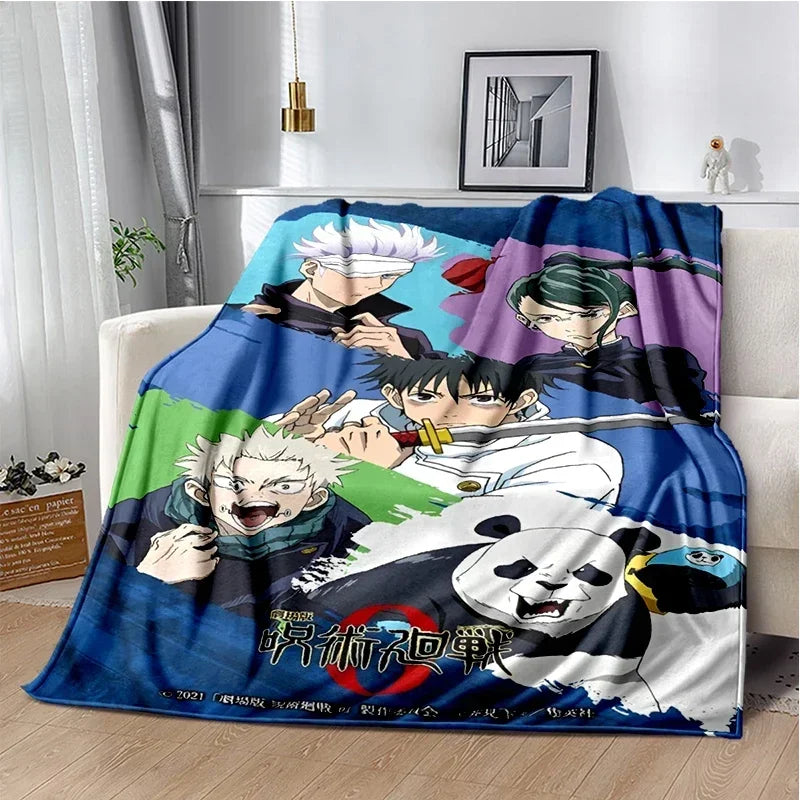 A blue and white anime-themed throw blanket featuring characters from Jujutsu Kaisen