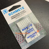A white sewing needle packaged by SCHMETZ, model HOHLSAUM-NADEL HEMSTITCH NEEDLE.