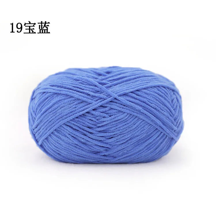 A ball of 19-gauge blue chenille yarn for knitting and crochet