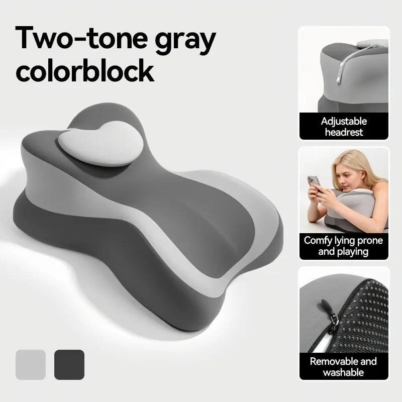 A two-tone gray colorblock pillow designed for comfortable lying prone support.