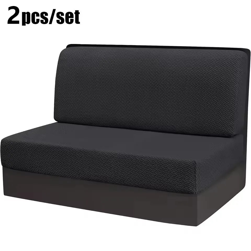 A black stretch jacquard seat cover for vehicle upholstery shown flat.