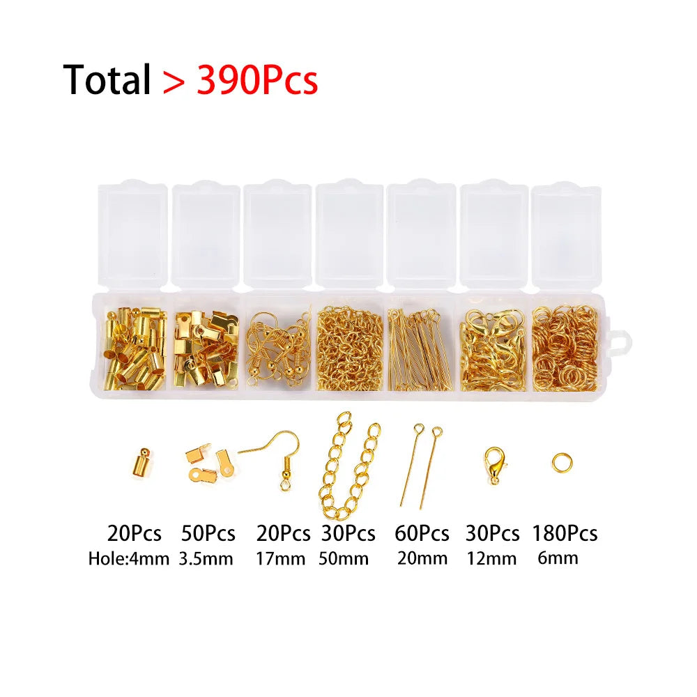 A set of gold-colored findings including various sizes and types of lobster clasps and jewelry components for making jewelry.