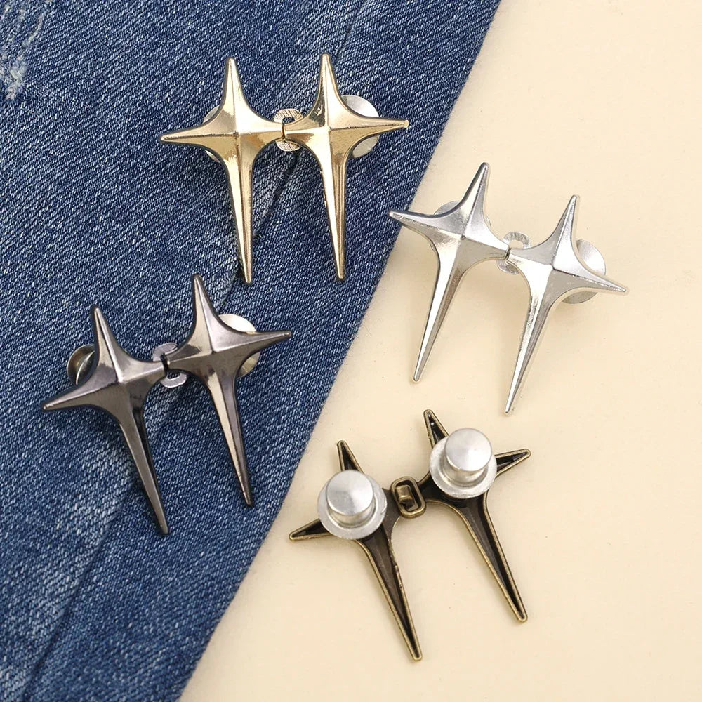 A collection of gold and silver Y2K star clips for fastening jeans and skirts.