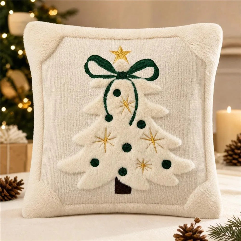 Cream velvet pillow cover embroidered with a green Christmas tree and gold stars