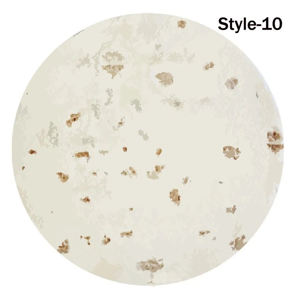 Style-10 is a light beige fabric with scattered brown stains.