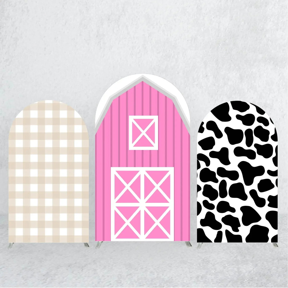 Three wooden arch backdrop covers in cream, pink, and black leopard print patterns.