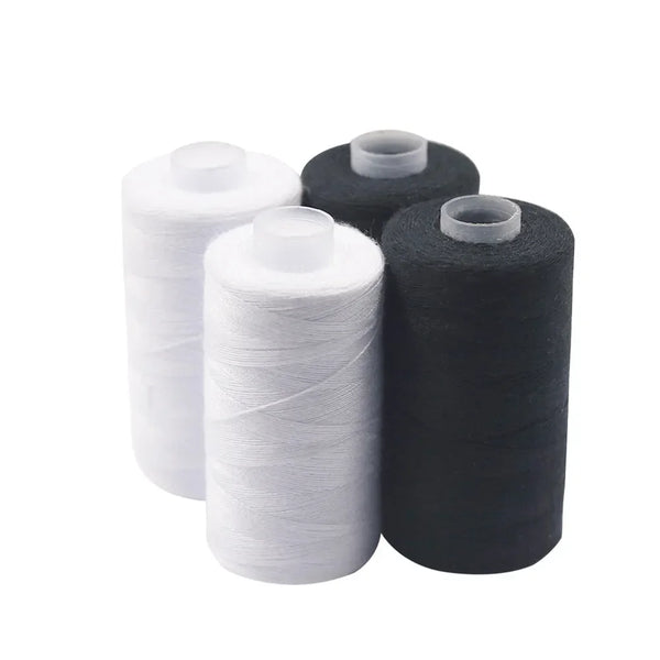 A set of black and white heavy duty polyester sewing thread spools.