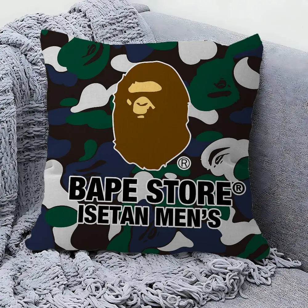 A decorative pillow cover featuring a camouflage pattern with a stylized lion's head and the text BAPE STORE ISETAN MEN'S