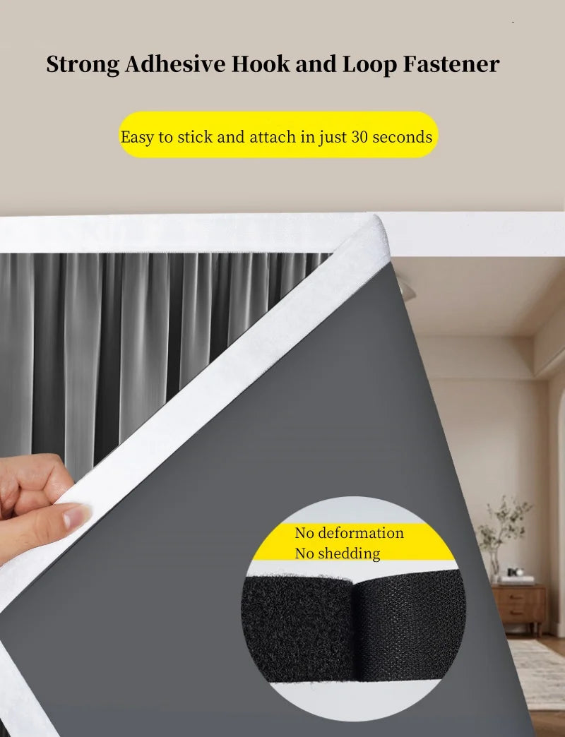 Close-up of a black hook and loop fastener being applied to a gray fabric surface.