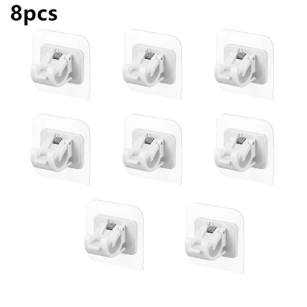 Eight self-adhesive curtain rod clips designed for mounting on windows and walls.