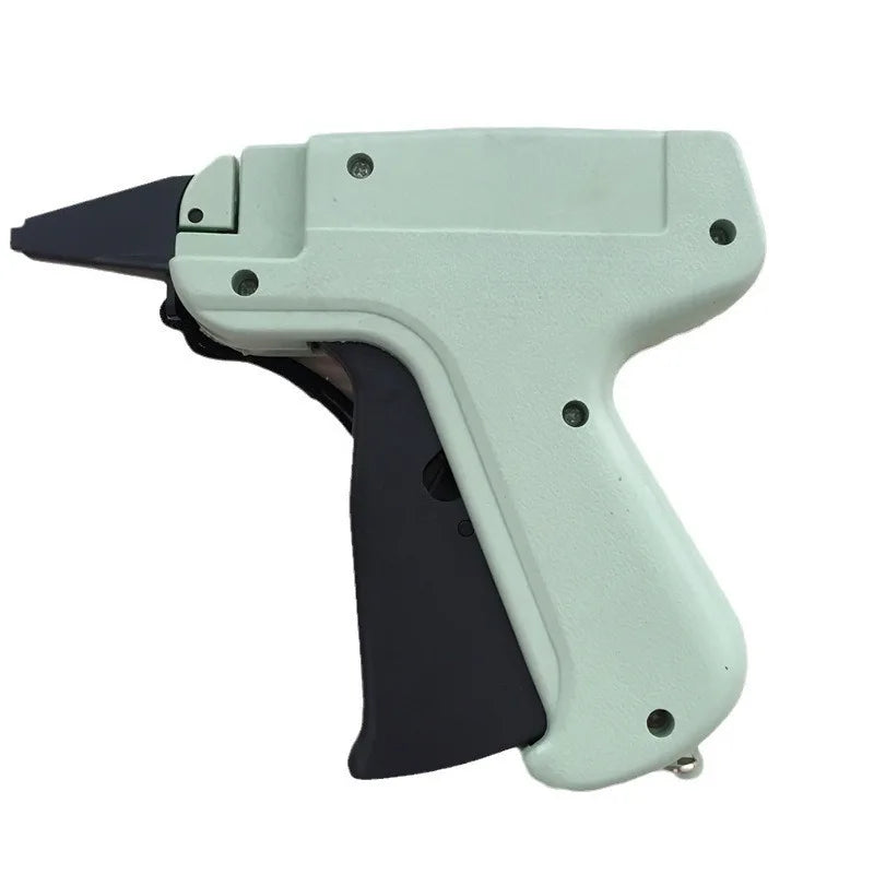 A light green precision sewing tag gun kit with a black and white grip and firing mechanism.