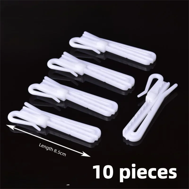 Ten white adjustable curtain hanging hooks displayed on a black background.