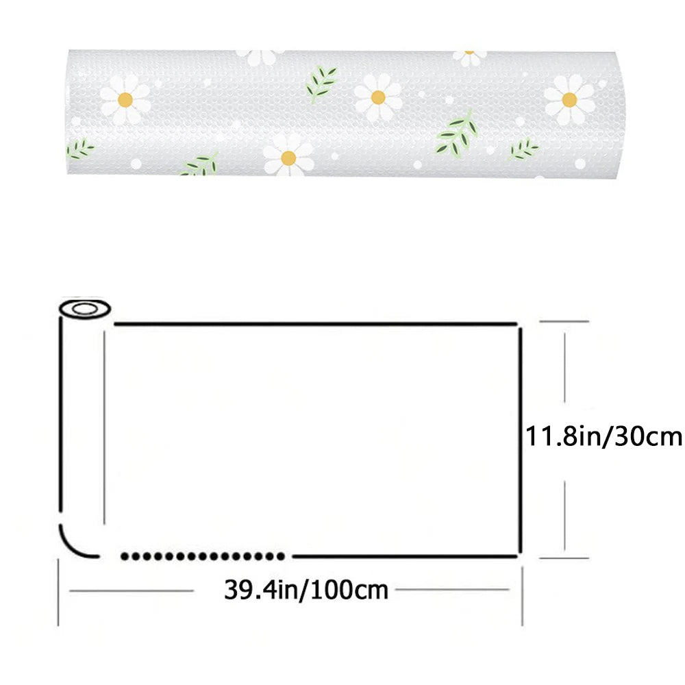 Roll of white silicone drawer mat featuring a pattern of small white and green flowers
