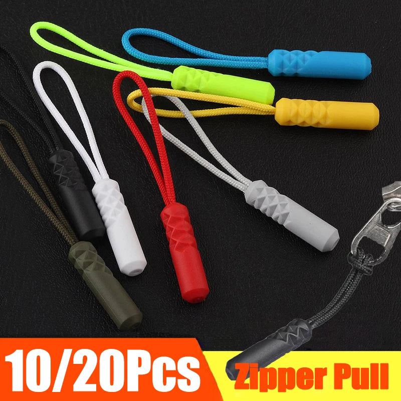A collection of colorful zipper pull replacement clips in various colors and styles, including silicone and plastic options.