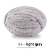 A ball of light gray extra thick hand-knitted yarn for crafting and gifts.