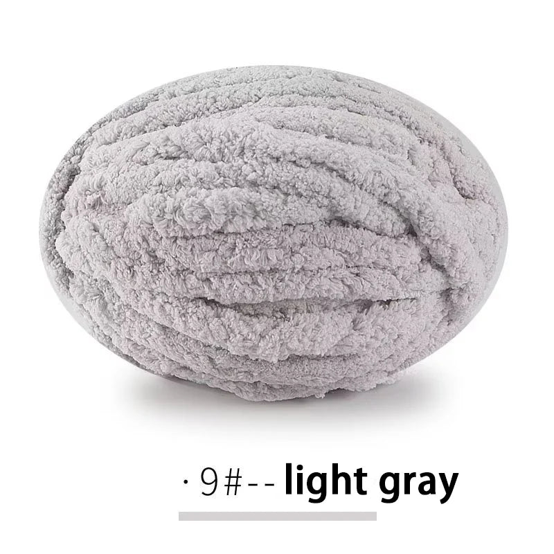 A ball of light gray extra thick hand-knitted yarn for crafting and gifts.