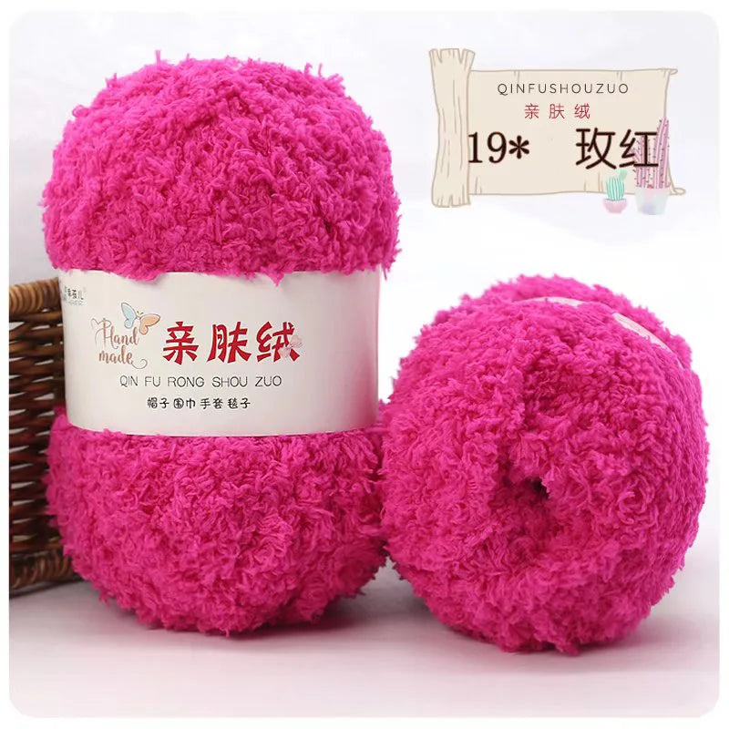 A pink fluffy yarn ball labeled as QINFUSHOUZUO 19 pack of pink yarn for crafting.