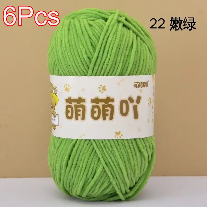 A ball of bright green chenille yarn labeled in Chinese characters for crochet and knitting.