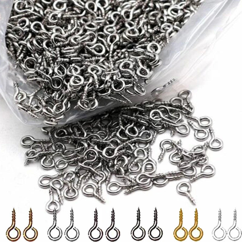 A pile of stainless steel eye screw pins for jewelry making in various sizes, including 8mm and 10mm.