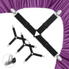 Black non-slip bed sheet clips and holders with silver metal grips displayed against a purple fabric background.