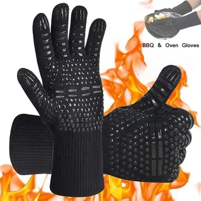 Black heat resistant BBQ and oven gloves with non-slip silicone grip shown against a fire background