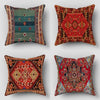 Four decorative cushion covers featuring intricate Persian patterns in red, gold, and teal tones.