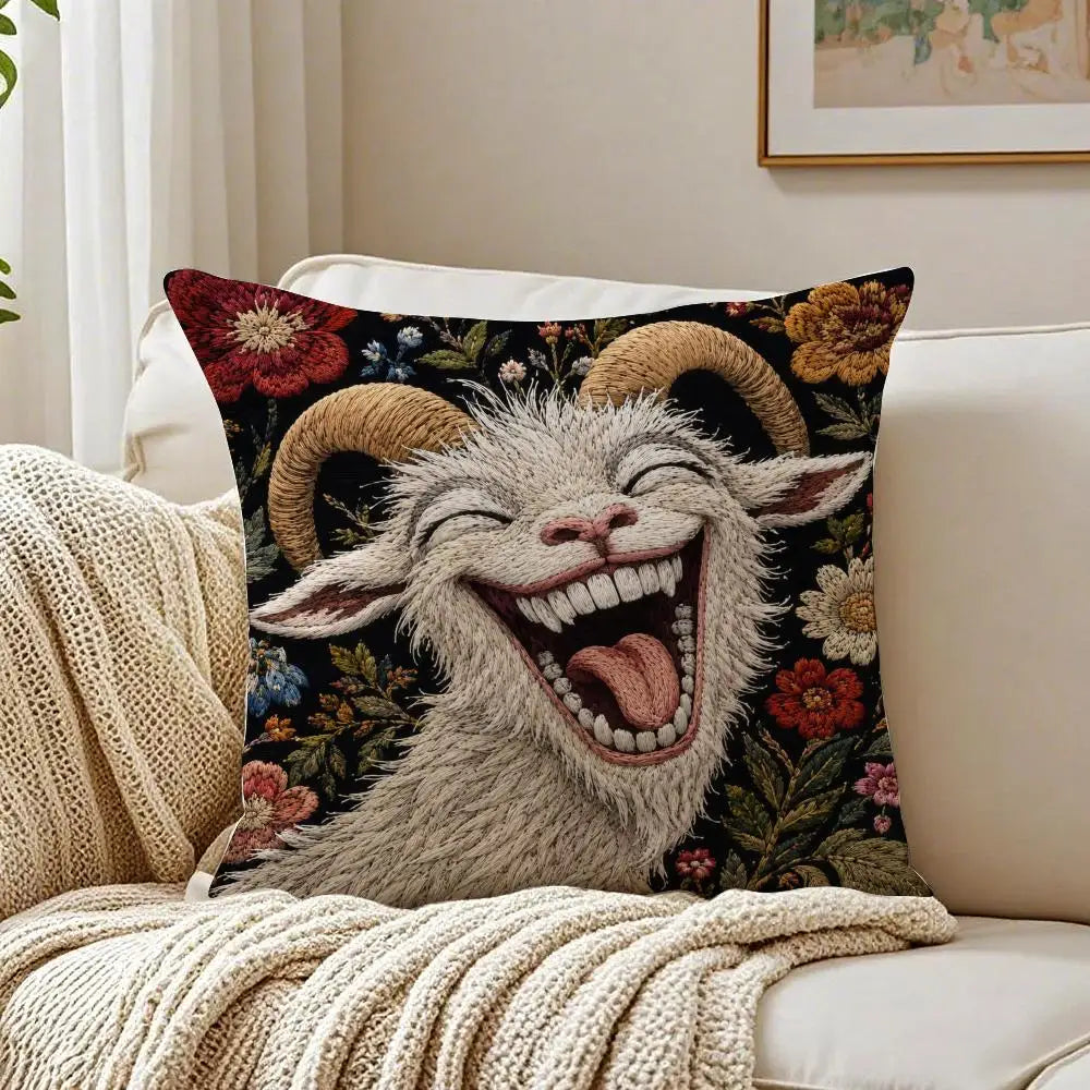 A decorative pillow featuring a realistic, smiling goat with large horns and an open mouth, set against a dark floral backgro