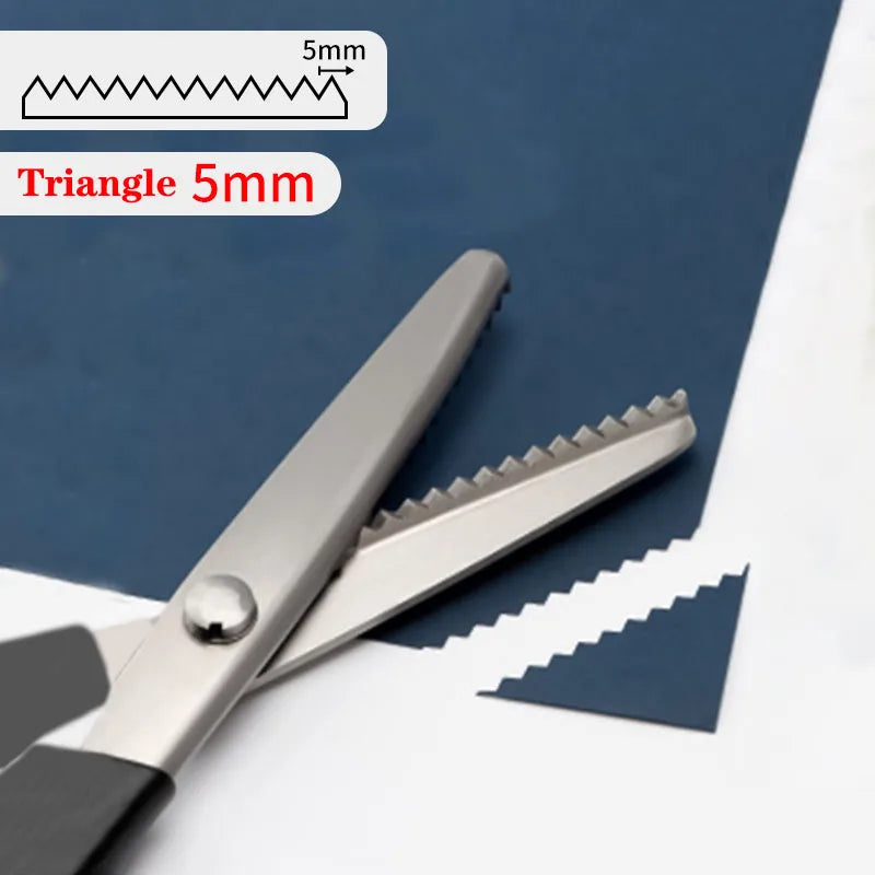 Professional stainless steel tailor's shears with a triangle-shaped cutting edge shown against a dark blue background.