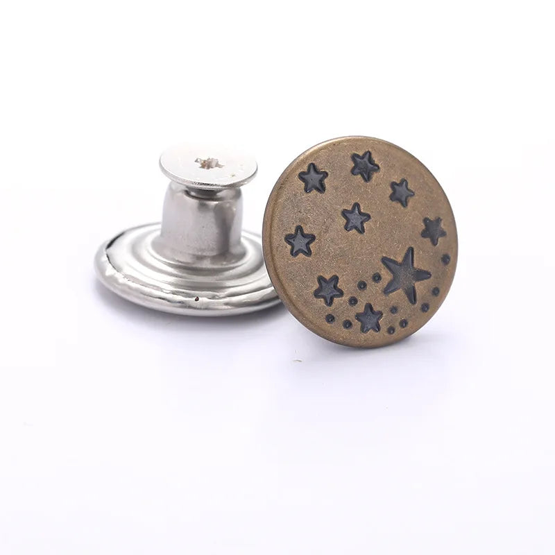 A round, bronze-colored metal button with small star engravings and a silver button post.