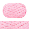 A pink hand-knitted wool finger line scarf in a textured knit pattern.