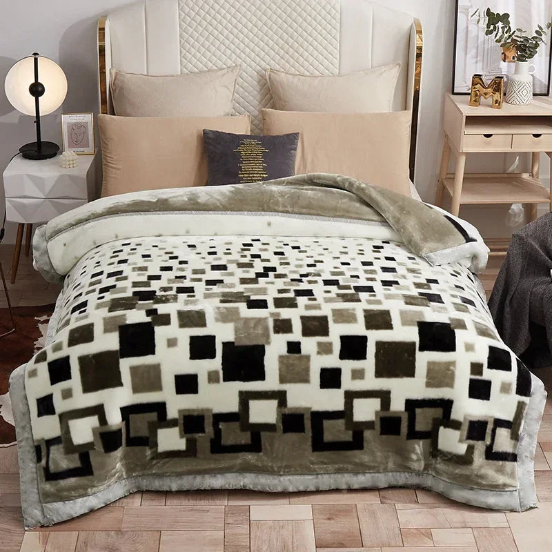 A beige weighted blanket is displayed on a bed with white linens and pillows.