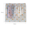 Transparent garment dust cover for hanging clothes showing a pink garment and various small yellow and blue circular patterns