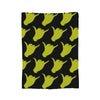 A black fabric with yellow hand shapes printed in a repeating pattern.