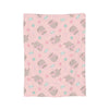 A pink coral fleece cat plush throw blanket featuring scattered gray and light blue cat patterns.