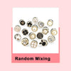 A collection of various instant removable pearl brooch buttons in different shapes and sizes.