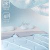 Light blue ice silk summer cooling blanket folded on a bed with decorative snowflake icons.