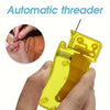 A hand holds a yellow automatic threader tool, demonstrating its use for threading needles.