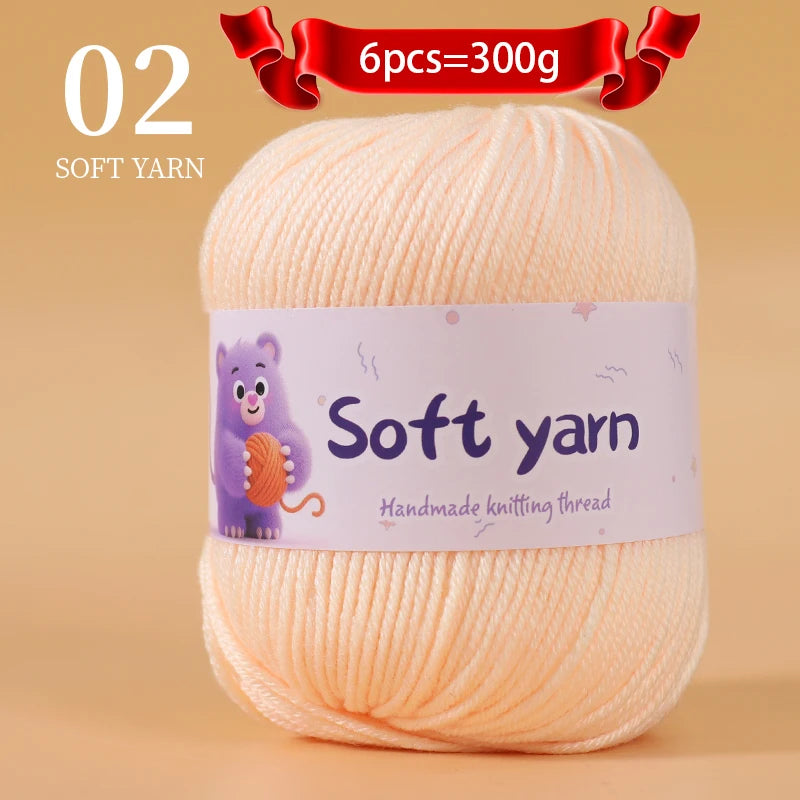 A ball of soft, light orange yarn labeled as Soft yarn for handmade knitting thread.