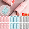 A set of 12 pink and light blue non-slip bed sheet grippers with adjustable clips shown in various forms.