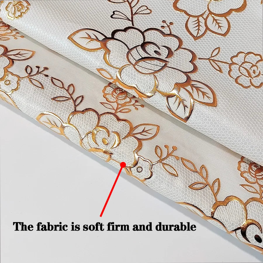 Close-up of a beige floral patterned fabric showing its soft, firm, and durable texture.