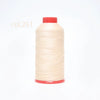 A spool of light beige heavy duty nylon sewing thread with a red cap.