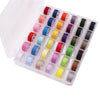 A plastic box containing an assortment of colored sewing thread bobbins.