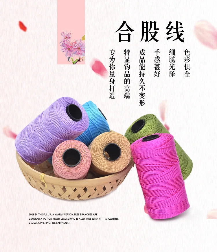 A collection of pink, purple, and green yarn spools for hand knitting and crochet crafting.
