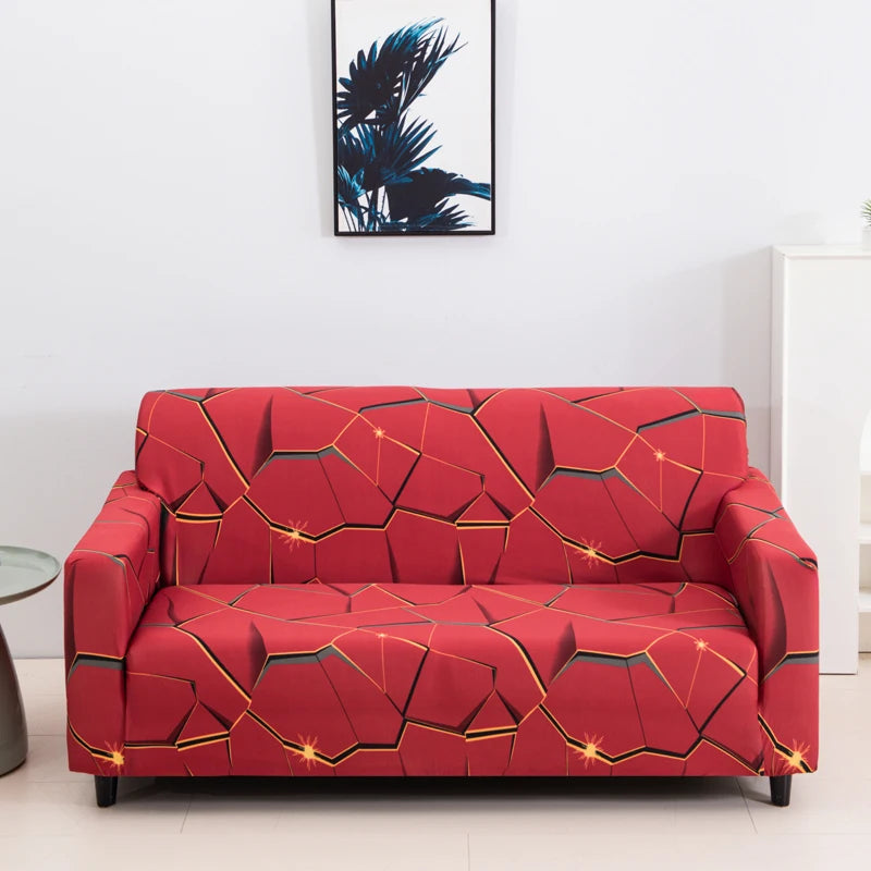 A modern, deep red sofa covered in a geometric, cracked pattern with gold accents.