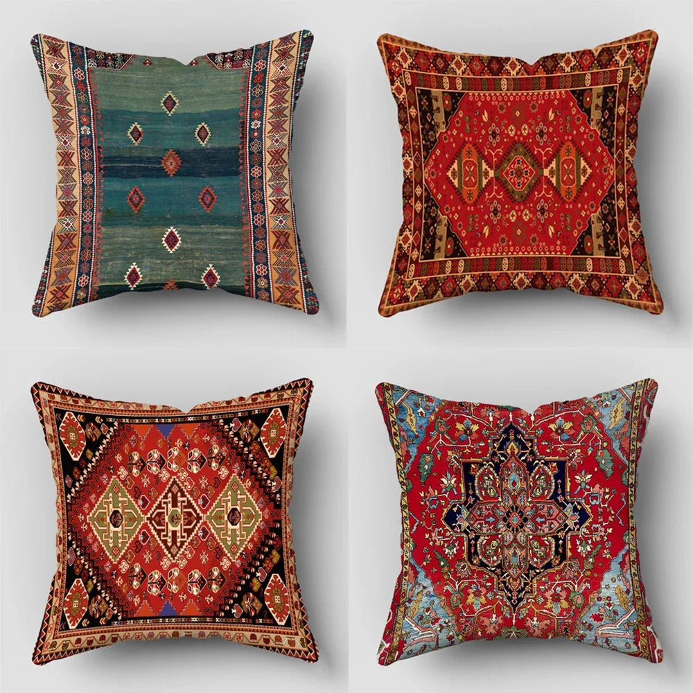 Four decorative cushion covers featuring intricate Persian patterns in red, green, and gold tones.