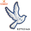 A white embroidered patch shaped like a bird in flight with the letters LOB visible.