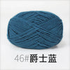 A ball of teal blue organic cotton 4ply knitting yarn labeled as 46# 爵士蓝.